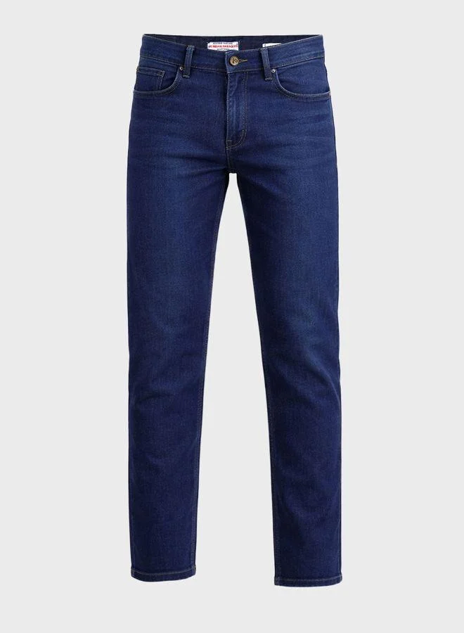 The Indian Garage Co  Men Slim Fit Solid Scoop Pocket Mid-Rise Jeans for Men | Best Price UAE